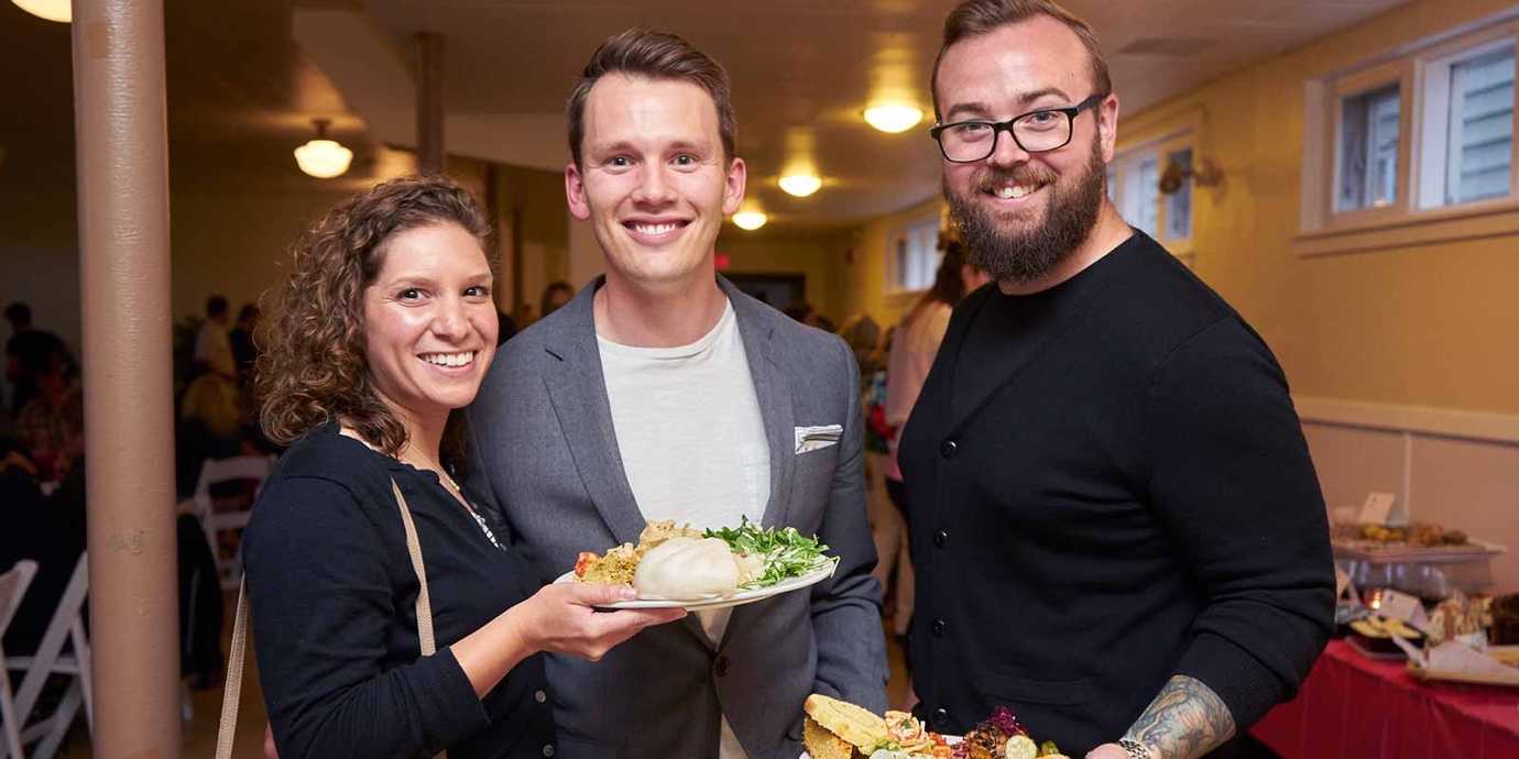 Marisa Morby, Nate Green, Jason Lengstorf at a Precision Nutrition charity pot luck.