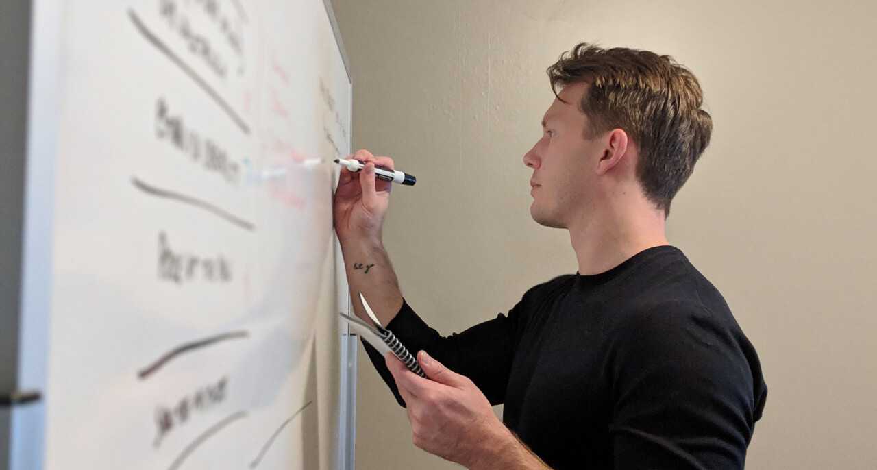 Nate at the whiteboard.