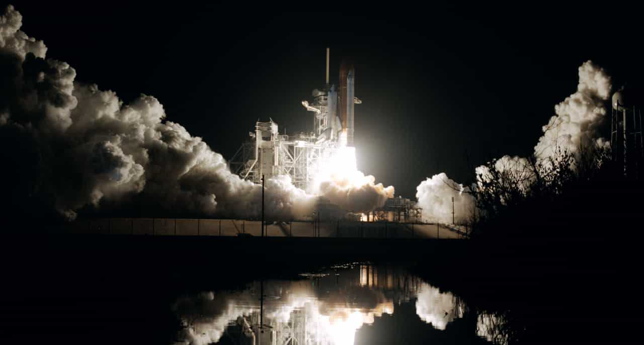 A rocket launch at night.