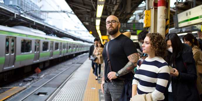 On the train platform in Tokyo.