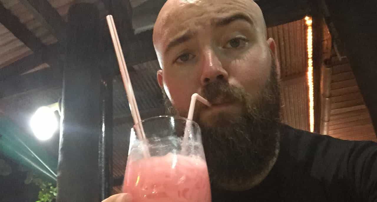 Jason with a pink drink.